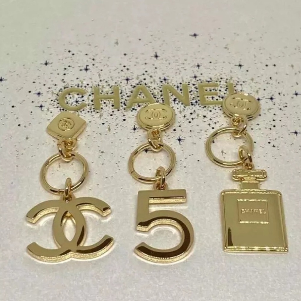 Chanel Gold Keychain Set Bag
NWT
Charm No 5 Bottle Chanel No 5
Double CC